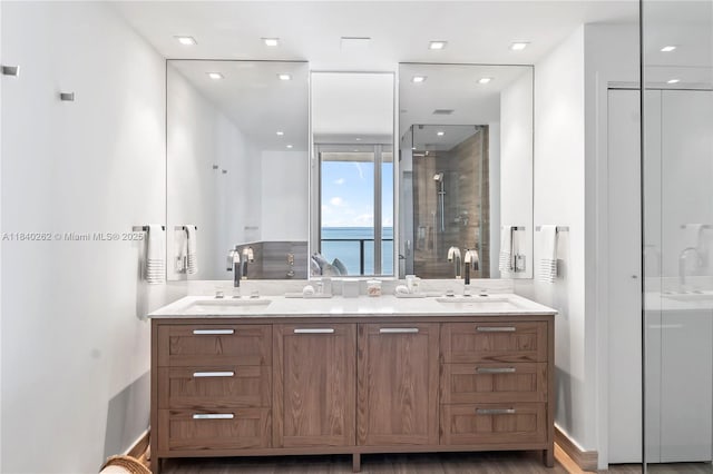 360 Ocean Dr Unit 704S, Key Biscayne, FL 33149 - full bathroom featuring double vanity and a stall shower