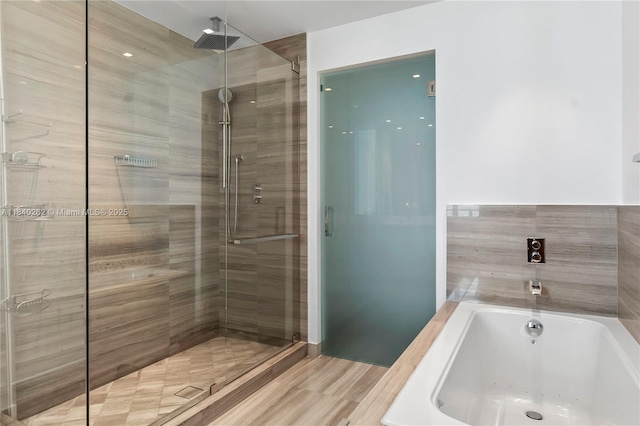 360 Ocean Dr Unit 704S, Key Biscayne, FL 33149 - full bath featuring a stall shower and a garden tub