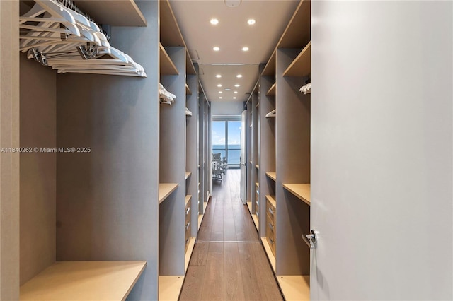 360 Ocean Dr Unit 704S, Key Biscayne, FL 33149 - spacious closet featuring light wood-type flooring