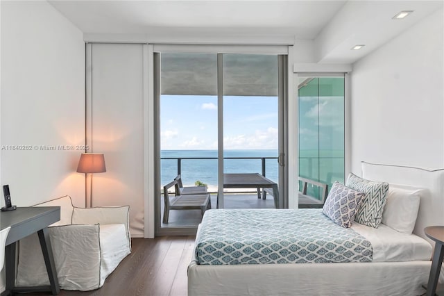 360 Ocean Dr Unit 704S, Key Biscayne, FL 33149 - bedroom with a wall of windows, access to exterior, a water view, and wood-type flooring