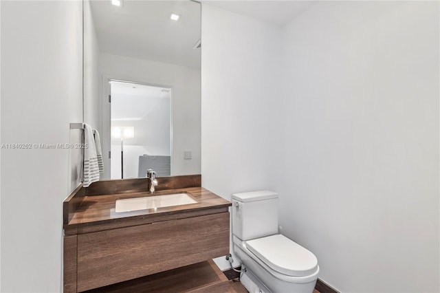 360 Ocean Dr Unit 704S, Key Biscayne, FL 33149 - half bathroom with toilet and vanity