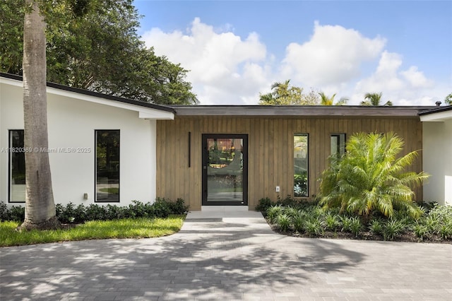 7805 SW 165th St, Palmetto Bay, FL 33157 - doorway to property featuring stucco siding