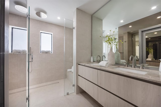 7805 SW 165th St, Palmetto Bay, FL 33157 - full bathroom featuring a shower stall, double vanity, and recessed lighting