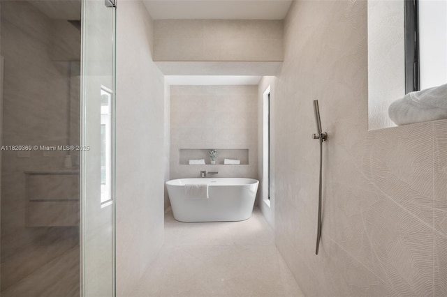 7805 SW 165th St, Palmetto Bay, FL 33157 - full bathroom with a freestanding tub and a tile shower
