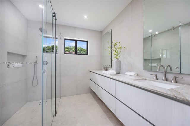 7805 SW 165th St, Palmetto Bay, FL 33157 - bathroom featuring double vanity, a stall shower, and recessed lighting