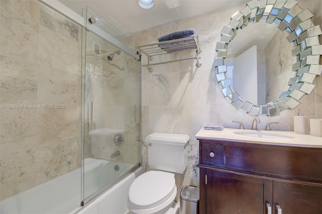 3801 S Ocean Dr Unit 5L, Hollywood, FL 33019 - bathroom featuring tile walls, shower / bath combination with glass door, and vanity