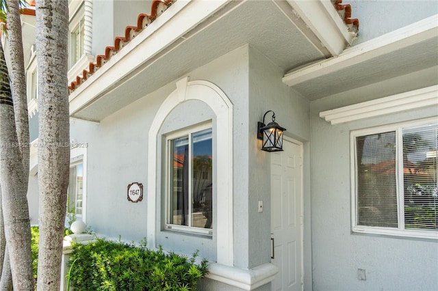 11647 NE 18th Dr Unit 11647, North Miami, FL 33181 - doorway to property featuring stucco siding