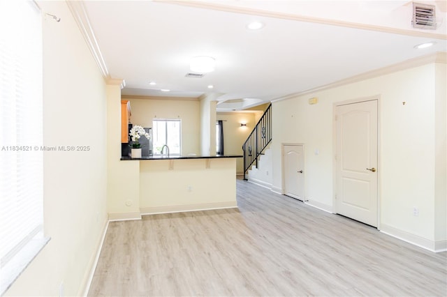 11647 NE 18th Dr Unit 11647, North Miami, FL 33181 - unfurnished living room featuring crown molding, light wood-style flooring, stairway, and recessed lighting