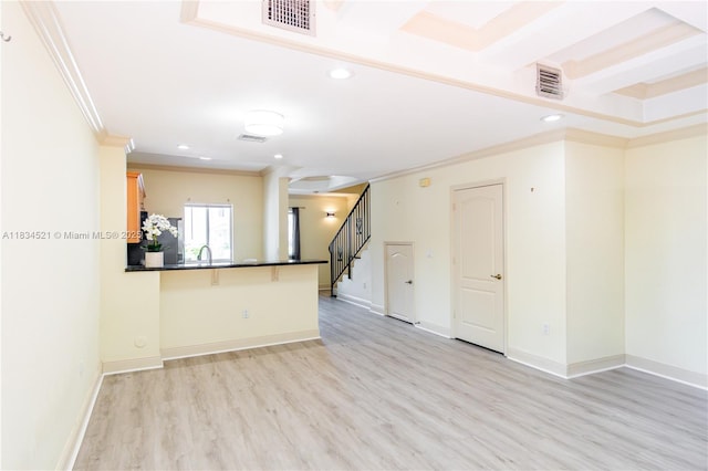 11647 NE 18th Dr Unit 11647, North Miami, FL 33181 - unfurnished living room with ornamental molding, light wood-style flooring, stairs, and recessed lighting