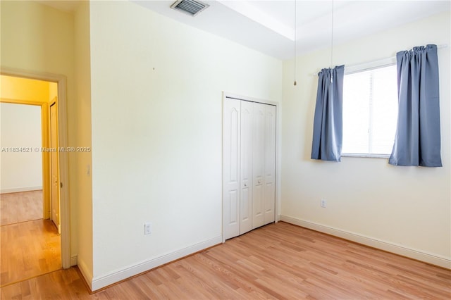 11647 NE 18th Dr Unit 11647, North Miami, FL 33181 - unfurnished bedroom with light wood-type flooring and a closet