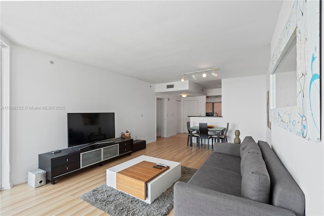 335 S Biscayne Blvd Unit 3410, Miami, FL 33131 - living room featuring wood finished floors