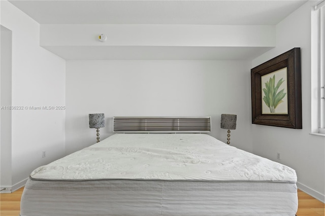335 S Biscayne Blvd Unit 3410, Miami, FL 33131 - bedroom with light wood finished floors and baseboards