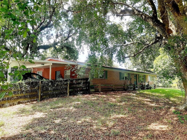 13851 SW 26th St, Davie, FL 33325 - back of house with a carport