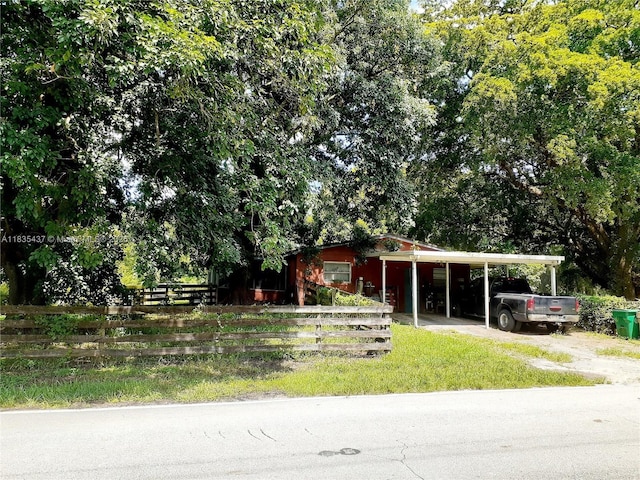 13851 SW 26th St, Davie, FL 33325 - view of front of home with a carport and driveway