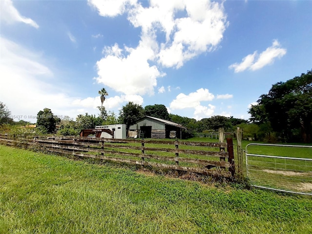 13851 SW 26th St, Davie, FL 33325 - view of yard featuring a view of countryside