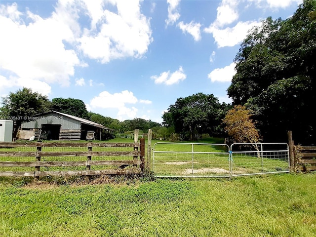 13851 SW 26th St, Davie, FL 33325 - view of yard with an outdoor structure and a view of rural / pastoral area