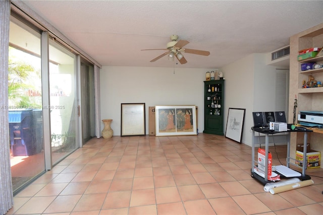 13935 SW 84th St Unit 905, Miami, FL 33183 - kitchen with plenty of natural light, ceiling fan, and light tile patterned flooring