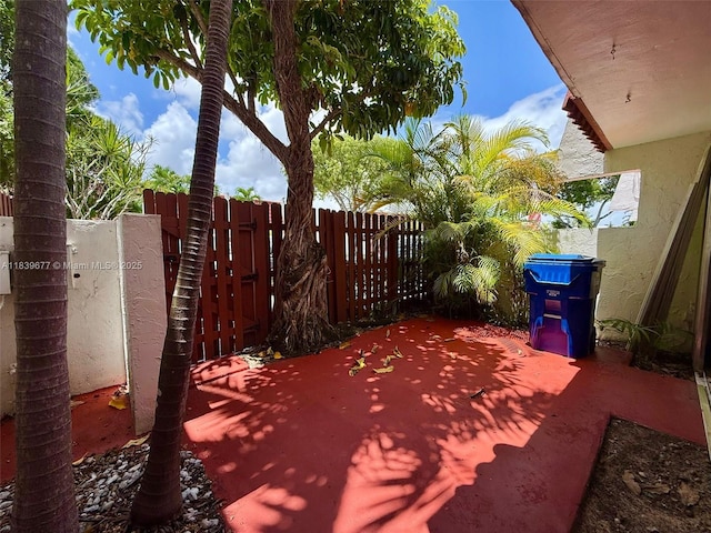 13935 SW 84th St Unit 905, Miami, FL 33183 - view of patio / terrace featuring a gate