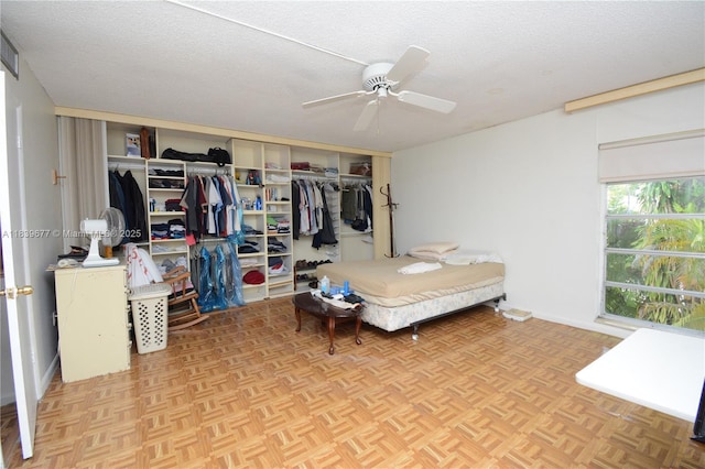 13935 SW 84th St Unit 905, Miami, FL 33183 - bedroom with a closet, a textured ceiling, and ceiling fan