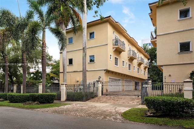 2919 Coconut Ave Unit 1, Miami, FL 33133 - view of property featuring decorative driveway and a fenced front yard