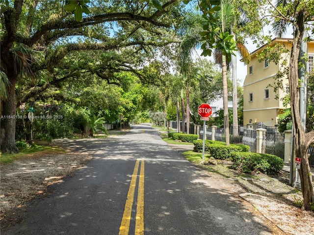 2919 Coconut Ave Unit 1, Miami, FL 33133 - view of asphalt road featuring traffic signs