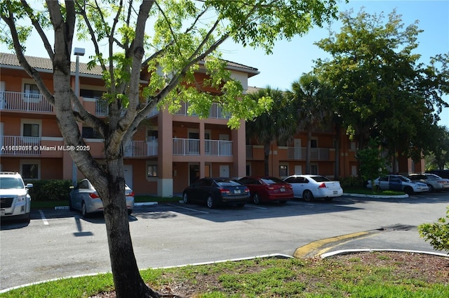 6900 SW 39th St Unit 208J, Davie, FL 33314 - view of apartment building / complex featuring uncovered parking