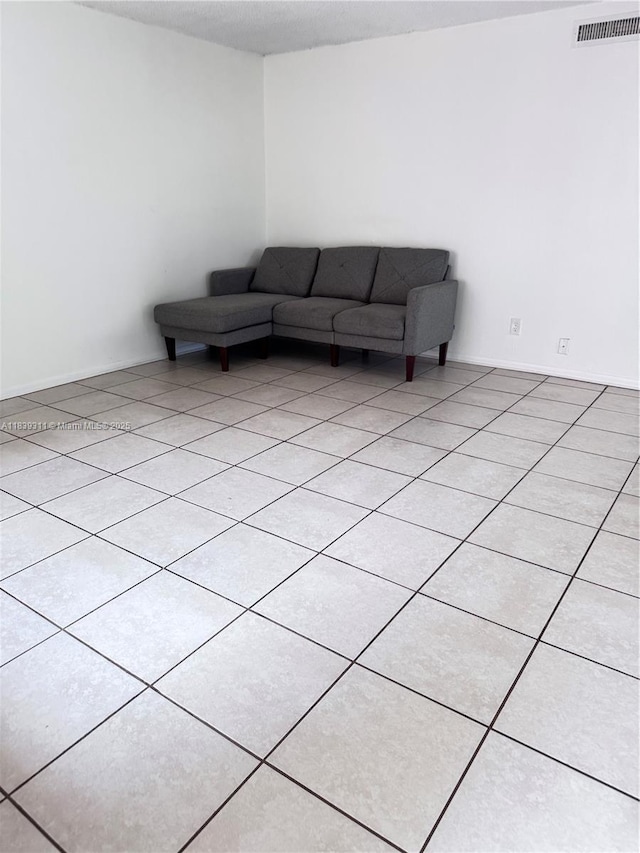 6900 SW 39th St Unit 208J, Davie, FL 33314 - living room featuring light tile patterned floors