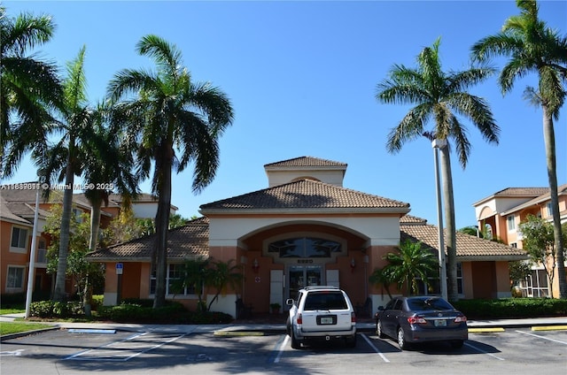 6900 SW 39th St Unit 208J, Davie, FL 33314 - view of building exterior with uncovered parking