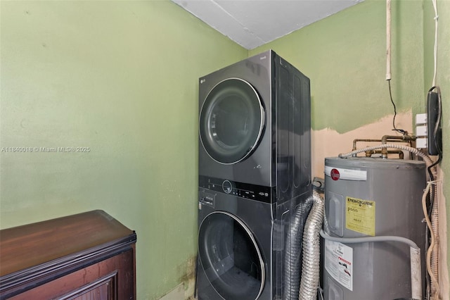 29351 Idaho Rd, Homestead, FL 33033 - washroom featuring electric water heater and stacked washer / dryer