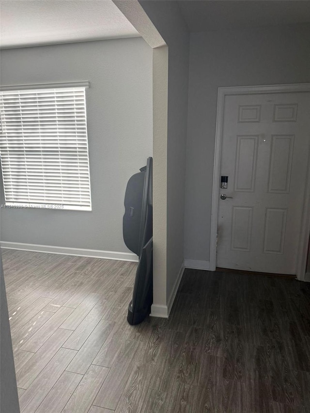 144 Taft Dr, Davenport, FL 33837 - empty room featuring wood finished floors and baseboards