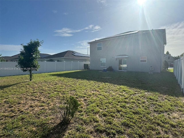144 Taft Dr, Davenport, FL 33837 - rear view of property featuring a fenced backyard
