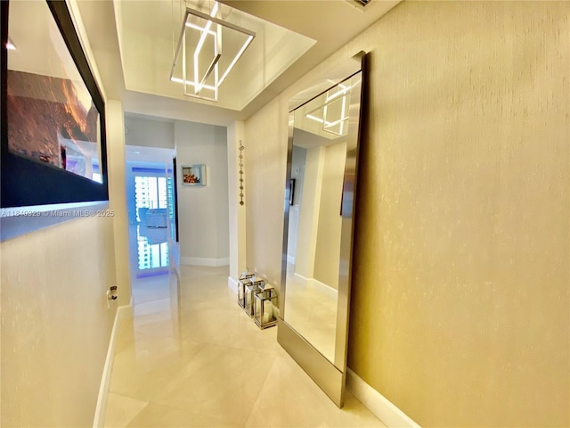 19900 E Country Club Dr Unit 1220, Aventura, FL 33180 - hallway featuring tile patterned floors and baseboards