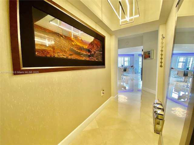 19900 E Country Club Dr Unit 1220, Aventura, FL 33180 - hall with tile patterned flooring and plenty of natural light