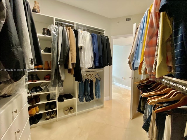 19900 E Country Club Dr Unit 1220, Aventura, FL 33180 - walk in closet with tile patterned floors