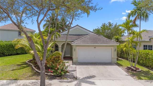 649 Willow Bend Rd, Weston, FL 33327 - view of front of property with stucco siding, an attached garage, driveway, and a tiled roof