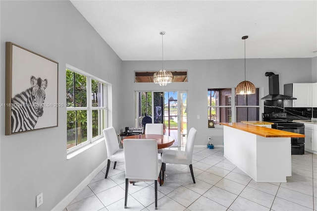 649 Willow Bend Rd, Weston, FL 33327 - dining area featuring a chandelier and light tile patterned floors