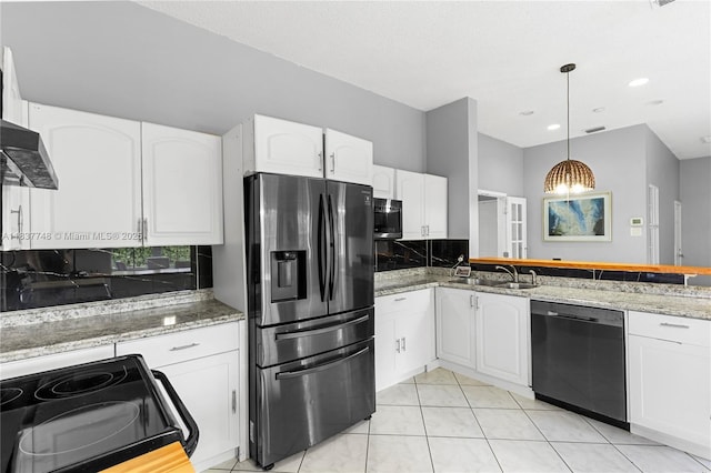 649 Willow Bend Rd, Weston, FL 33327 - kitchen featuring black appliances, white cabinets, backsplash, pendant lighting, and light stone counters