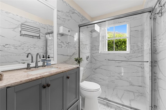 649 Willow Bend Rd, Weston, FL 33327 - bathroom featuring marble look tiles, vanity, a marble finish shower, and tile walls