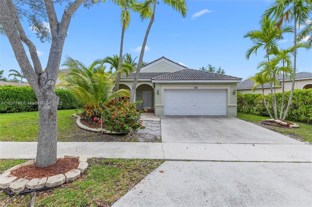 649 Willow Bend Rd, Weston, FL 33327 - view of front facade with concrete driveway, an attached garage, stucco siding, a tile roof, and a front lawn