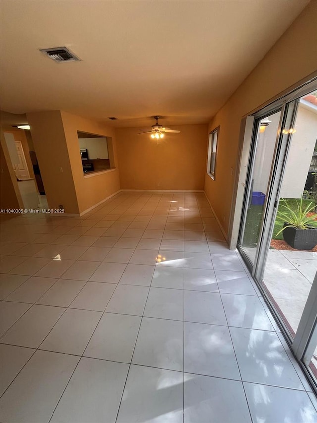 4041 NW 84th Ter Unit 4041, Sunrise, FL 33351 - unfurnished room featuring light tile patterned floors, plenty of natural light, and ceiling fan