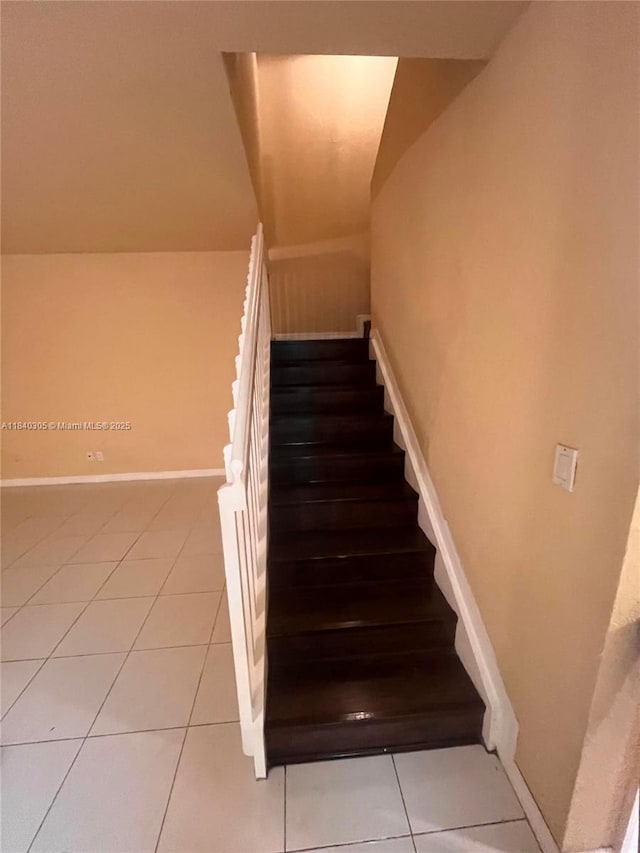 4041 NW 84th Ter Unit 4041, Sunrise, FL 33351 - stairway featuring tile patterned floors and baseboards