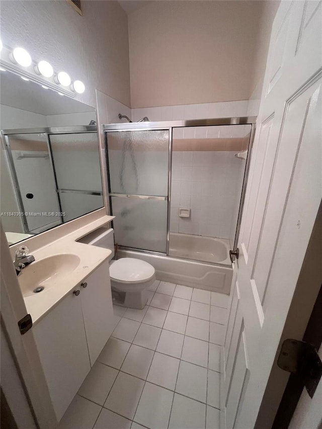 4041 NW 84th Ter Unit 4041, Sunrise, FL 33351 - bathroom featuring tile patterned floors, vanity, and combined bath / shower with glass door