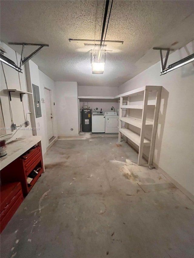 4041 NW 84th Ter Unit 4041, Sunrise, FL 33351 - garage with electric water heater, electric panel, washer and dryer, and a garage door opener