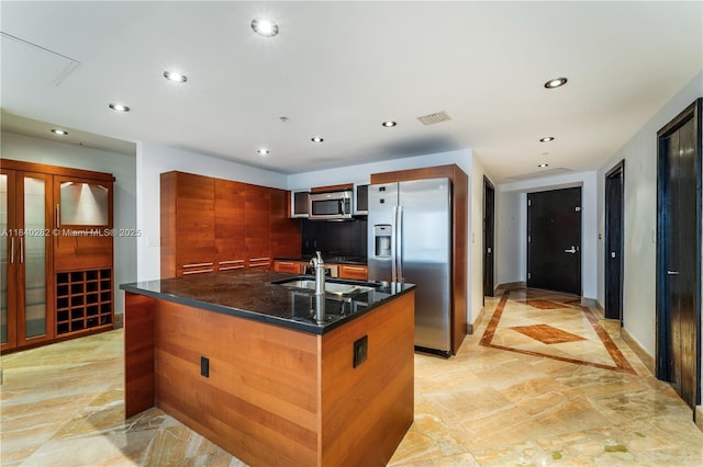 1900 N Bayshore Dr Unit 3715, Miami, FL 33132 - kitchen with appliances with stainless steel finishes, recessed lighting, a kitchen island with sink, dark stone countertops, and modern cabinets