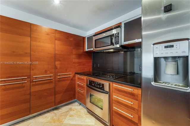1900 N Bayshore Dr Unit 3715, Miami, FL 33132 - kitchen featuring stainless steel appliances, modern cabinets, brown cabinetry, and dark countertops