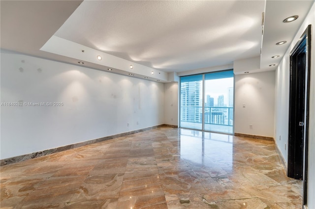 1900 N Bayshore Dr Unit 3715, Miami, FL 33132 - spare room featuring baseboards