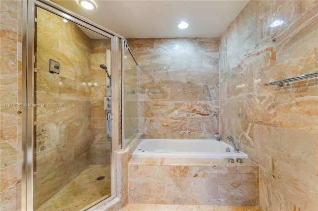 1900 N Bayshore Dr Unit 3715, Miami, FL 33132 - bathroom with a shower stall, a bath, recessed lighting, and tile walls