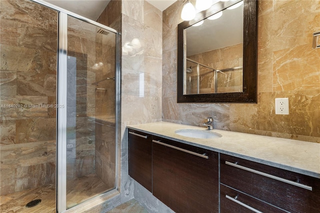 1900 N Bayshore Dr Unit 3715, Miami, FL 33132 - bathroom with tile walls, vanity, a shower stall, and backsplash