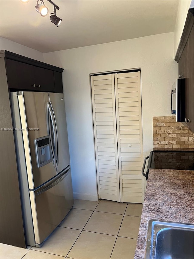 80 W 20th St, Hialeah, FL 33010 - kitchen with stainless steel fridge with ice dispenser, light tile patterned floors, and electric range oven