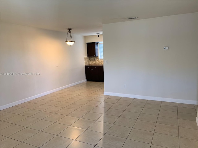 80 W 20th St, Hialeah, FL 33010 - unfurnished room with light tile patterned flooring and baseboards
